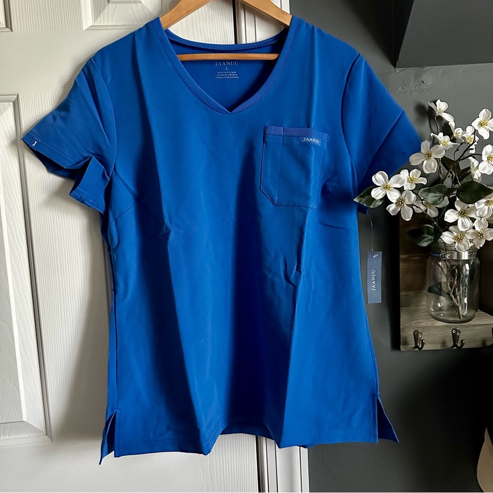 Jaanuu Women’s 2 Pocket Tuck-In Scrub Top in Royal Blue